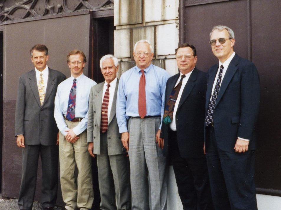 10 Pre Construction Exterior with Paul and Board Members 2.jpg
